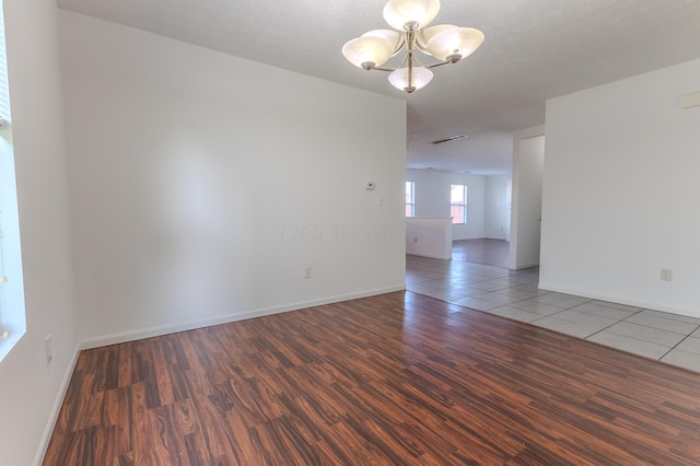 5480 Rothermund Dr, Canal Winchester, OH 43110 - empty room with wood finished floors and a chandelier