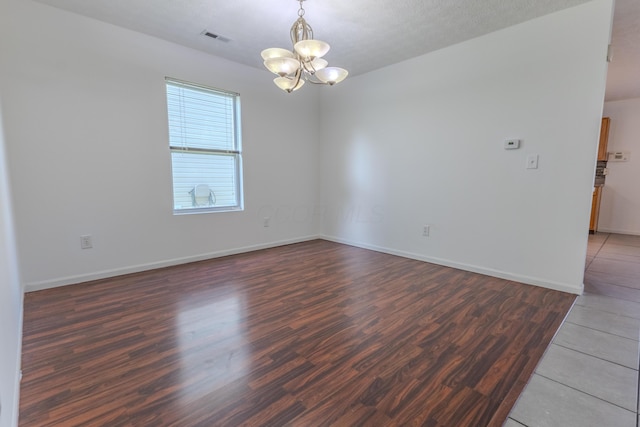 5480 Rothermund Dr, Canal Winchester, OH 43110 - spare room featuring a chandelier and wood finished floors