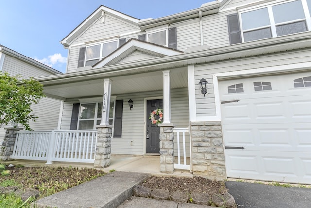 5480 Rothermund Dr, Canal Winchester, OH 43110 - view of front of home with a porch and stone siding