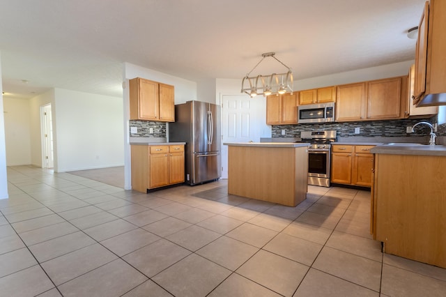 5480 Rothermund Dr, Canal Winchester, OH 43110 - kitchen featuring appliances with stainless steel finishes, decorative backsplash, a center island, light tile patterned floors, and decorative light fixtures