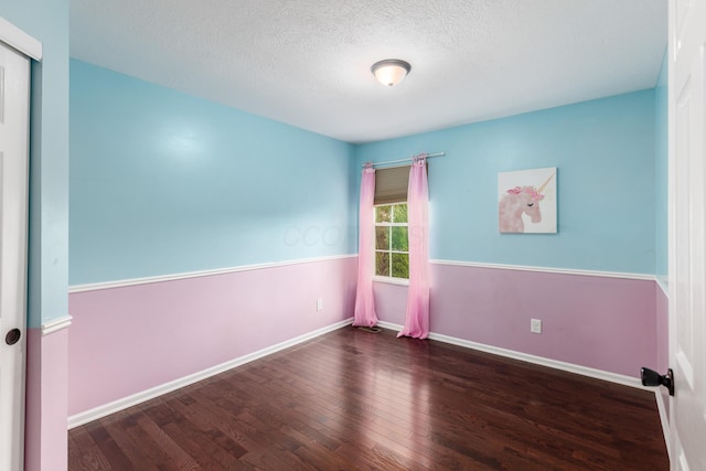 7774 Kingman Pl, Lewis Center, OH 43035 - spare room featuring wood finished floors and a textured ceiling