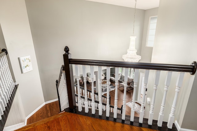7774 Kingman Pl, Lewis Center, OH 43035 - stairway with wood finished floors and baseboards