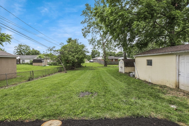 3749 Dort Pl, Columbus, OH 43227 - view of yard featuring a storage unit