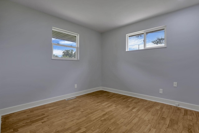 3749 Dort Pl, Columbus, OH 43227 - spare room with plenty of natural light and light wood finished floors