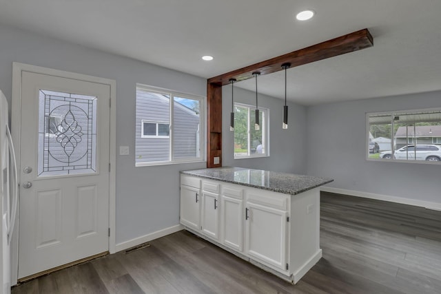 3749 Dort Pl, Columbus, OH 43227 - kitchen featuring a peninsula, white cabinets, dark wood-style floors, healthy amount of natural light, and recessed lighting