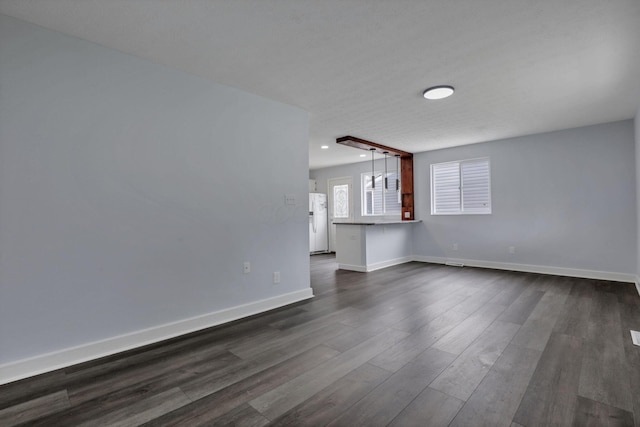 3749 Dort Pl, Columbus, OH 43227 - unfurnished living room featuring dark wood-style floors and recessed lighting
