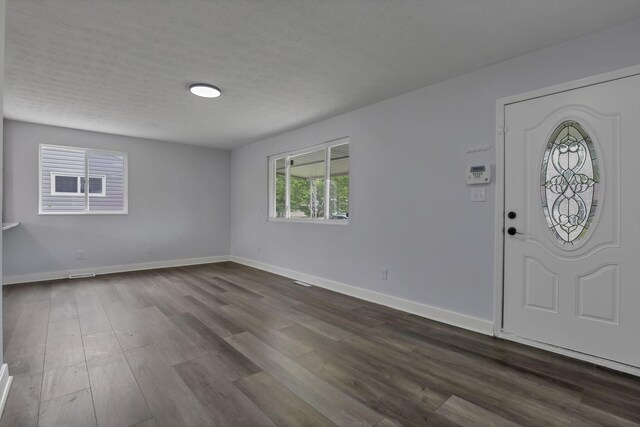 3749 Dort Pl, Columbus, OH 43227 - foyer entrance featuring dark wood finished floors