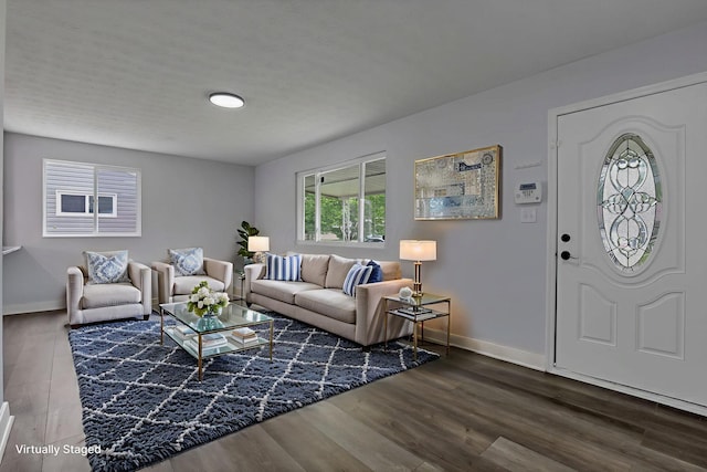 3749 Dort Pl, Columbus, OH 43227 - living area featuring baseboards and dark wood-type flooring