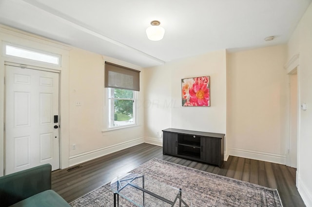 626 S 22nd St, Columbus, OH 43205 - living room featuring dark wood finished floors and baseboards