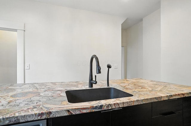 626 S 22nd St, Columbus, OH 43205 - kitchen featuring dark cabinets and light countertops
