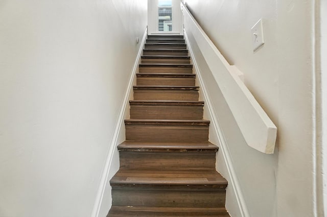 626 S 22nd St, Columbus, OH 43205 - staircase featuring wood finished floors