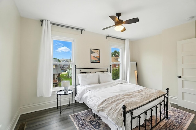 626 S 22nd St, Columbus, OH 43205 - bedroom with dark wood finished floors and a ceiling fan