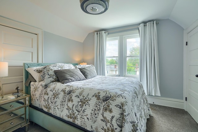 1332 E Deshler Ave, Columbus, OH 43206 - bedroom with vaulted ceiling and dark colored carpet