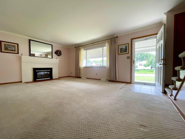 2666 Eugene Ave, Grove City, OH 43123 - unfurnished living room featuring ornamental molding, a fireplace with flush hearth, and light carpet