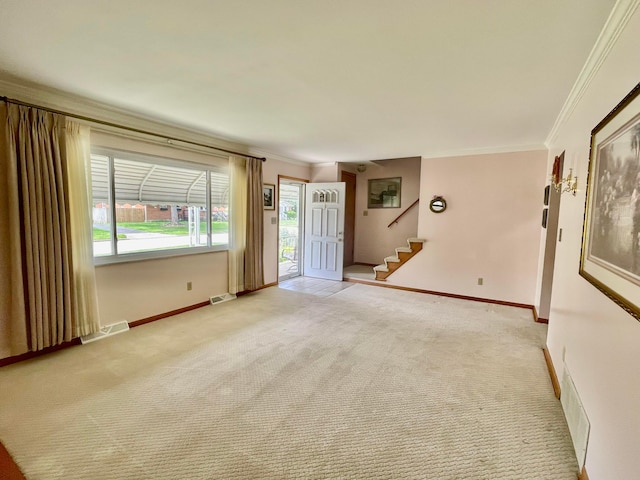 2666 Eugene Ave, Grove City, OH 43123 - unfurnished living room with ornamental molding, stairway, and light carpet