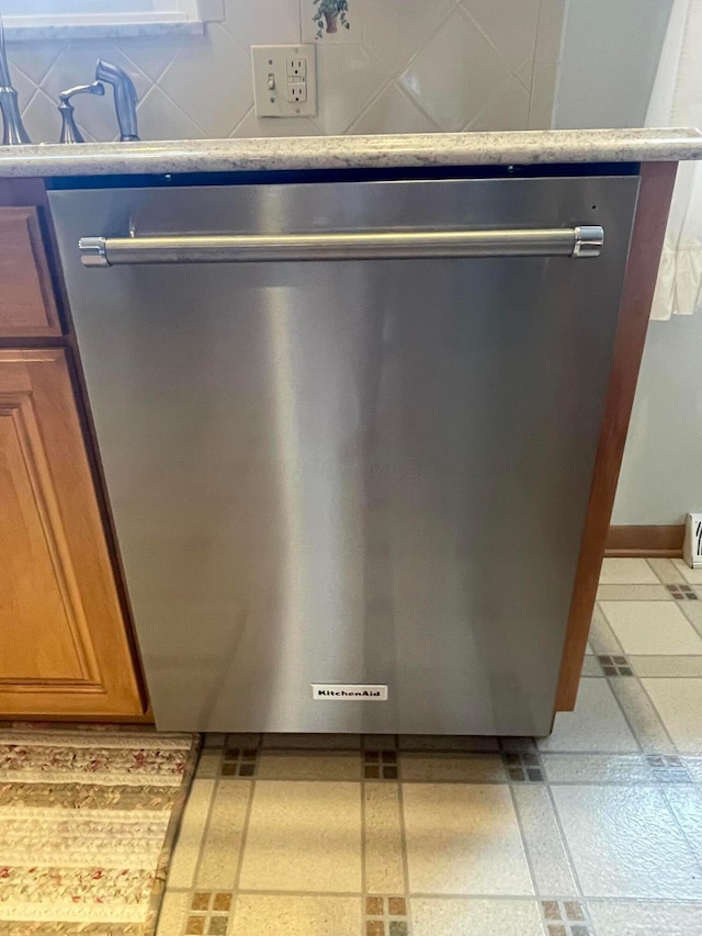 2666 Eugene Ave, Grove City, OH 43123 - kitchen view of stainless steel dishwasher and brown cabinets