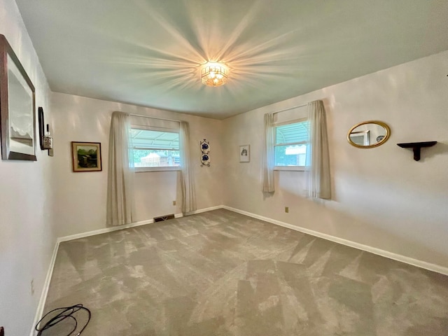 2666 Eugene Ave, Grove City, OH 43123 - spare room featuring carpet floors and plenty of natural light