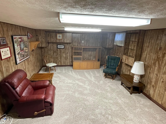 2666 Eugene Ave, Grove City, OH 43123 - living area with carpet floors, wood walls, and a textured ceiling
