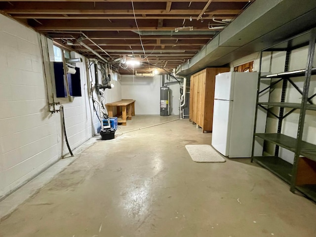 2666 Eugene Ave, Grove City, OH 43123 - unfinished below grade area with freestanding refrigerator, gas water heater, and concrete block wall