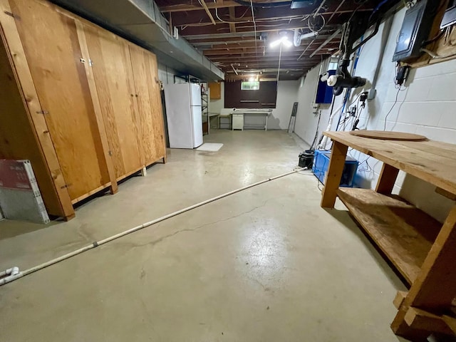 2666 Eugene Ave, Grove City, OH 43123 - unfinished basement featuring freestanding refrigerator