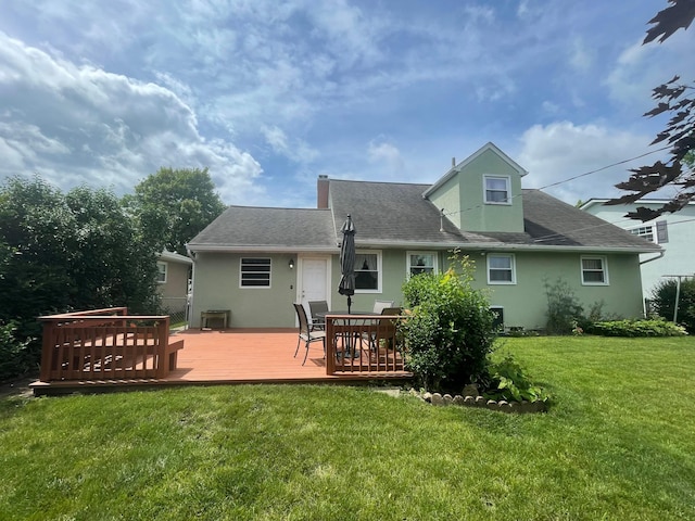 2666 Eugene Ave, Grove City, OH 43123 - back of property with stucco siding, a yard, a deck, and roof with shingles