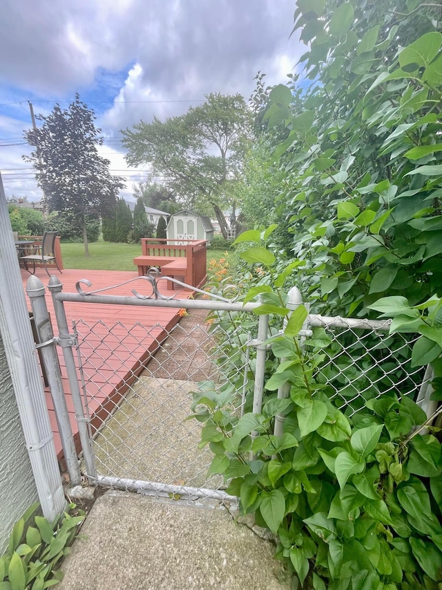 2666 Eugene Ave, Grove City, OH 43123 - view of tennis court with a storage unit and a gate