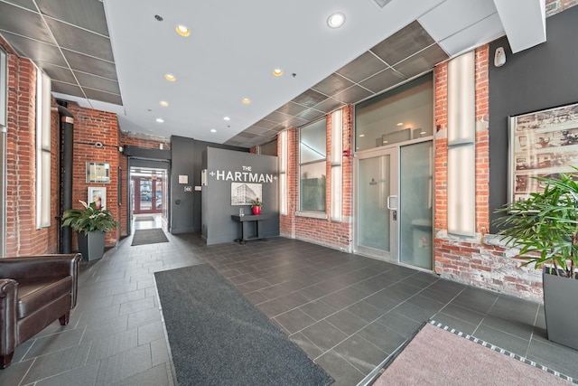 150 E Main St Unit 512, Columbus, OH 43215 - common area with brick wall and recessed lighting