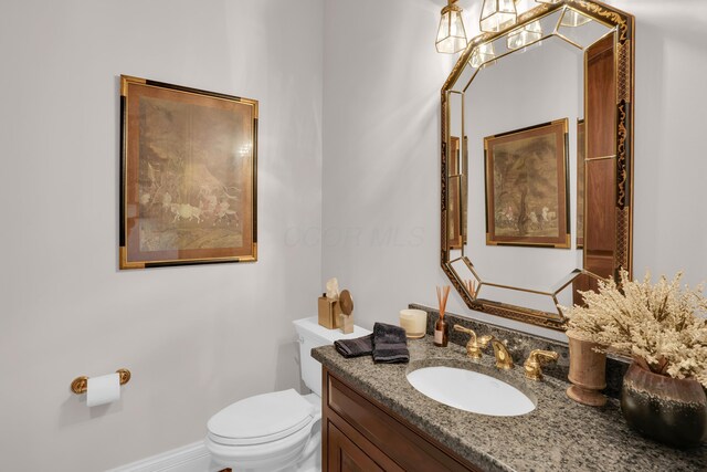 10277 Mackenzie Way, Dublin, OH 43017 - half bathroom featuring vanity and toilet