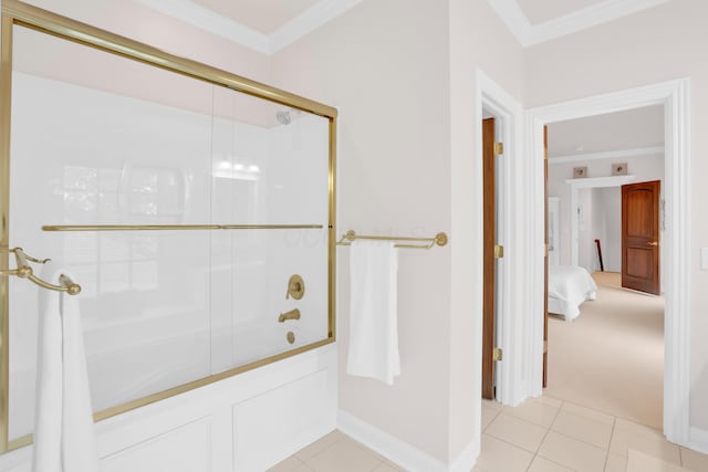 10277 Mackenzie Way, Dublin, OH 43017 - ensuite bathroom featuring crown molding, enclosed tub / shower combo, and tile patterned floors