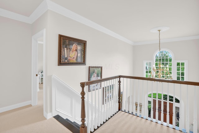 10277 Mackenzie Way, Dublin, OH 43017 - hallway featuring crown molding, carpet, and an upstairs landing