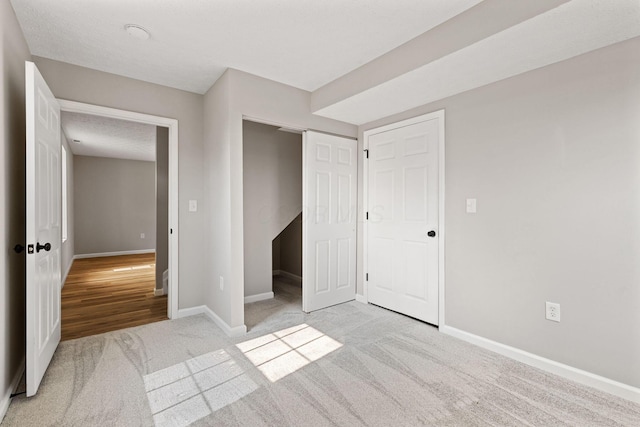 1664 S Champion Ave, Columbus, OH 43207 - unfurnished bedroom featuring light colored carpet and a closet
