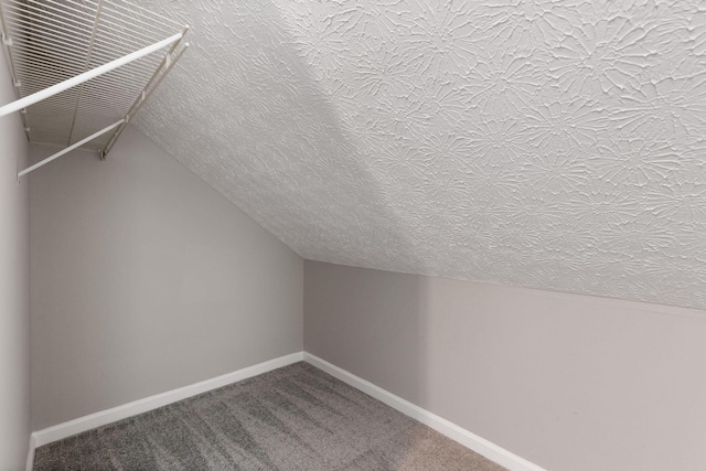 1664 S Champion Ave, Columbus, OH 43207 - bonus room with a textured ceiling, lofted ceiling, and carpet floors
