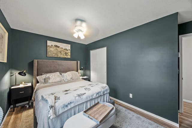 876 Kirkwood Dr, West Jefferson, OH 43162 - bedroom featuring wood finished floors and a ceiling fan