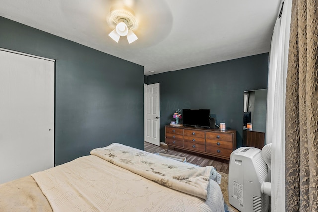 876 Kirkwood Dr, West Jefferson, OH 43162 - bedroom featuring wood finished floors and a ceiling fan