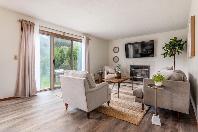 3351 Lindstrom Dr, Columbus, OH 43228 - living area featuring a fireplace and wood finished floors