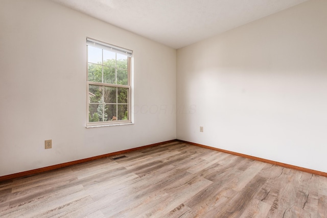 3351 Lindstrom Dr, Columbus, OH 43228 - empty room with light wood finished floors and baseboards
