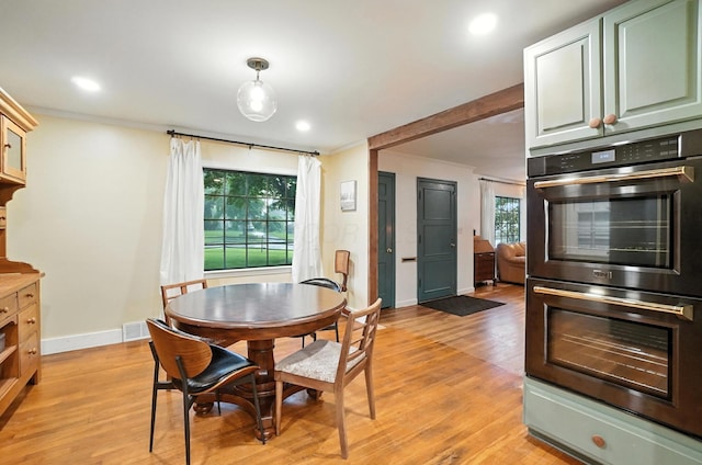 2620 Edgevale Rd, Columbus, OH 43221 - dining space with crown molding, light wood-style flooring, and recessed lighting