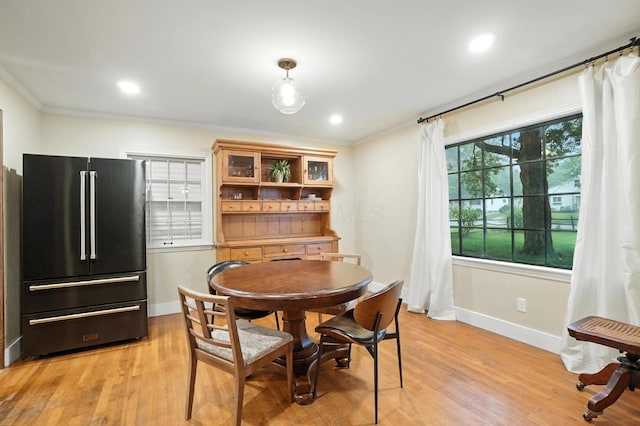2620 Edgevale Rd, Columbus, OH 43221 - dining room featuring light wood-style floors, recessed lighting, and crown molding