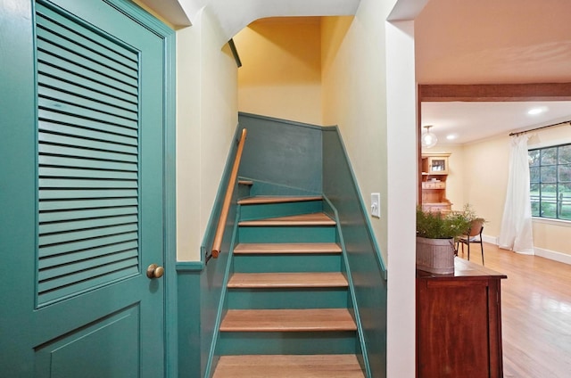 2620 Edgevale Rd, Columbus, OH 43221 - stairs with wood finished floors, recessed lighting, and arched walkways