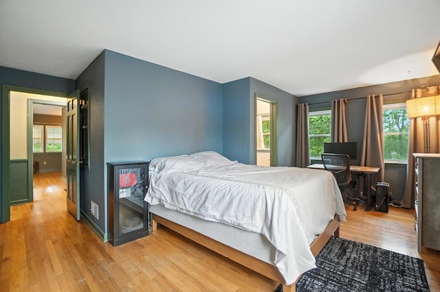 2620 Edgevale Rd, Columbus, OH 43221 - bedroom with light wood-style flooring and multiple windows