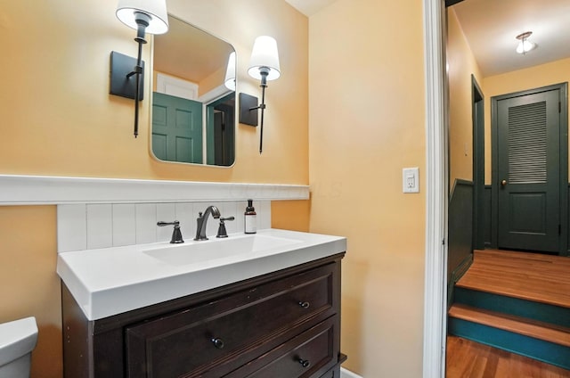 2620 Edgevale Rd, Columbus, OH 43221 - bathroom featuring vanity and wood finished floors