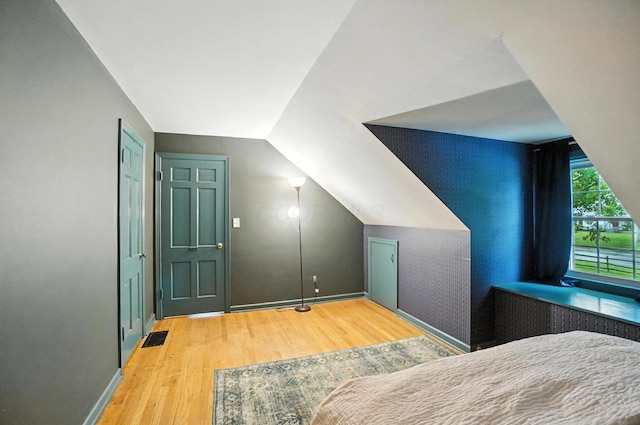 2620 Edgevale Rd, Columbus, OH 43221 - bedroom with wood finished floors and vaulted ceiling