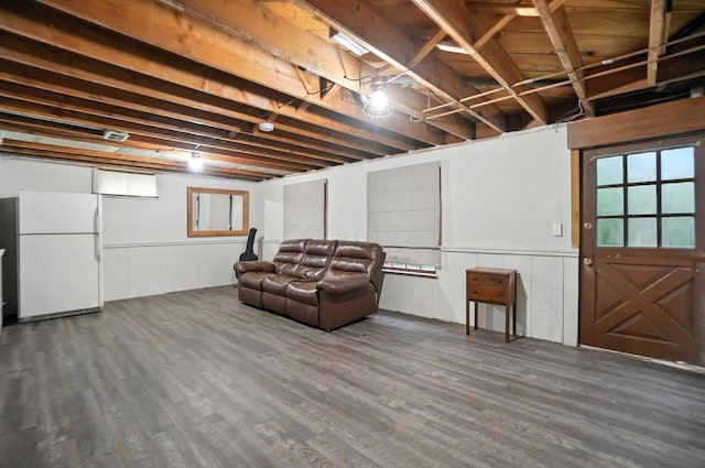 2620 Edgevale Rd, Columbus, OH 43221 - basement featuring freestanding refrigerator, wood finished floors, and a wainscoted wall