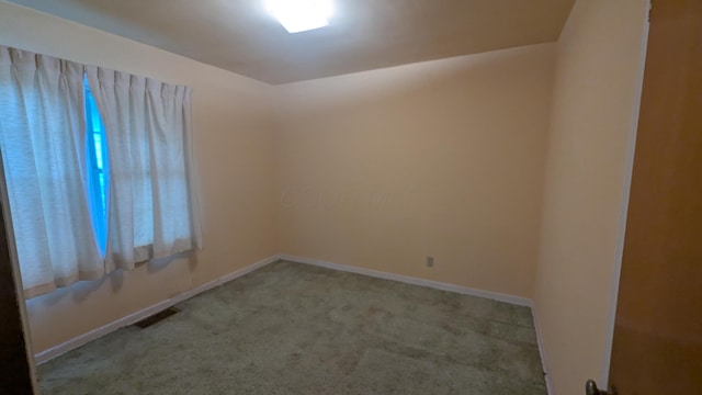 708 Fairview Ave, Galion, OH 44833 - unfurnished room with carpet and baseboards