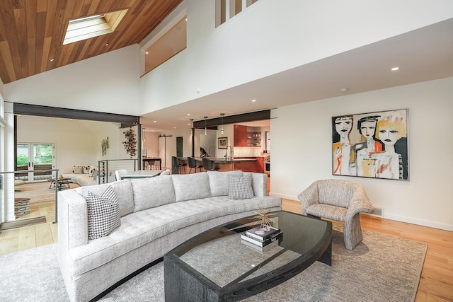 150 Pinehurst Dr, Granville, OH 43023 - living area featuring high vaulted ceiling, light wood finished floors, recessed lighting, and wood ceiling