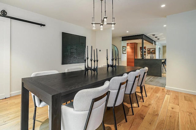150 Pinehurst Dr, Granville, OH 43023 - dining space with light wood-type flooring, recessed lighting, and bar area