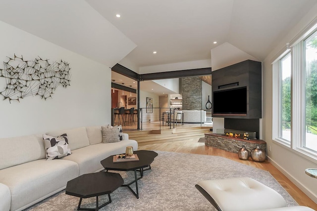 150 Pinehurst Dr, Granville, OH 43023 - living area featuring light wood-type flooring, plenty of natural light, and lofted ceiling