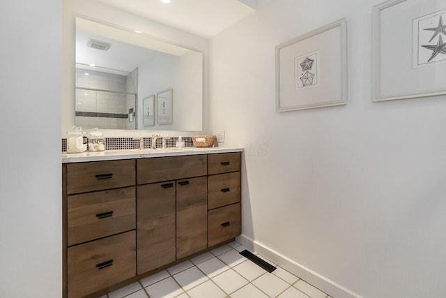150 Pinehurst Dr, Granville, OH 43023 - full bathroom featuring vanity, tile patterned flooring, and a tile shower