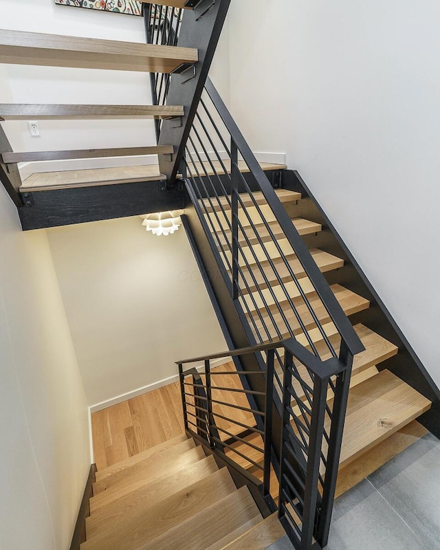 150 Pinehurst Dr, Granville, OH 43023 - stairs featuring wood finished floors