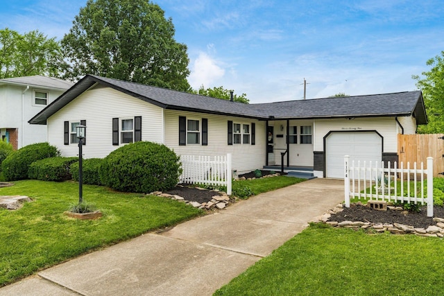 1174 Belden Rd, Columbus, OH 43229 - single story home featuring an attached garage, driveway, and roof with shingles